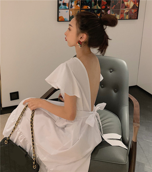 Model de rochie de dama cu croiala moderna in alb si negru