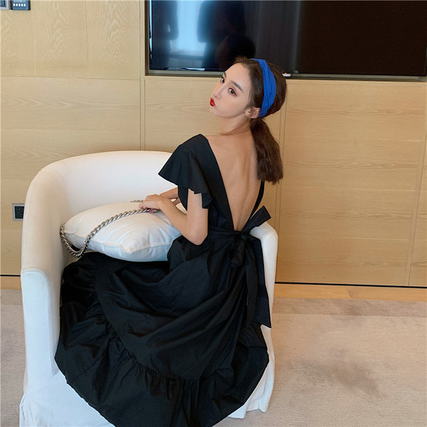 Model de rochie de dama cu croiala moderna in alb si negru