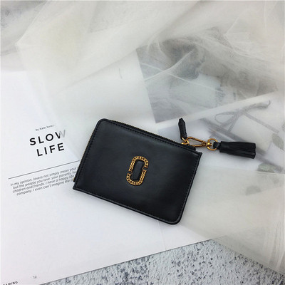 Стилен дамски портфейл с метална декорация и пискюл