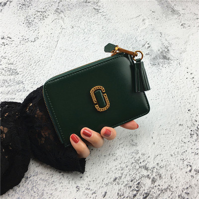 Стилен дамски портфейл с метална декорация и пискюл