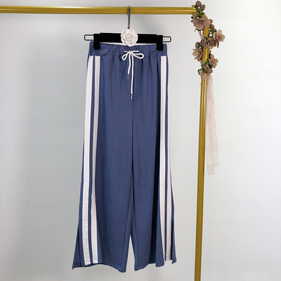 Pantaloni sport largi cu talie elastica si margini