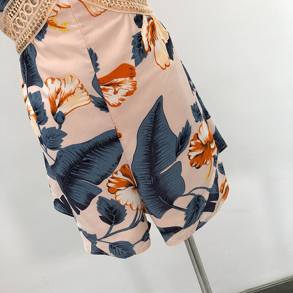 Γυναικεία ολόσωμη φόρμα με βαθύ λαιμό V και δαντέλα