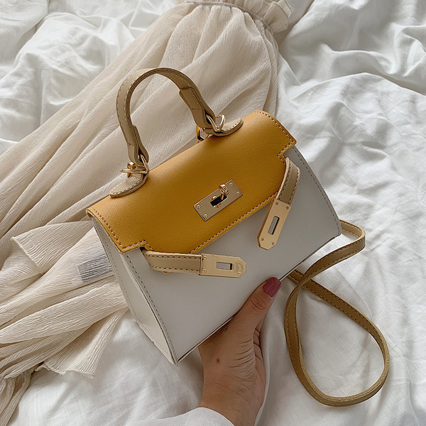 Geanta de dama moderna cu inchidere metalica