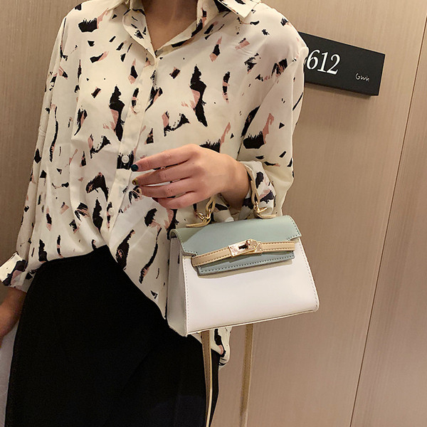 Geanta de dama moderna cu inchidere metalica