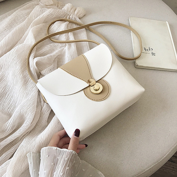 Geanta de dama cu decor metalic din piele ecologica