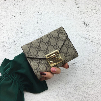 Portofel de dama modern cu decor metalic