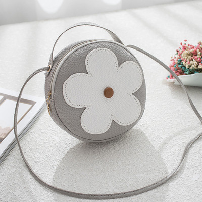 Geanta de dama moderna in forma rotunda