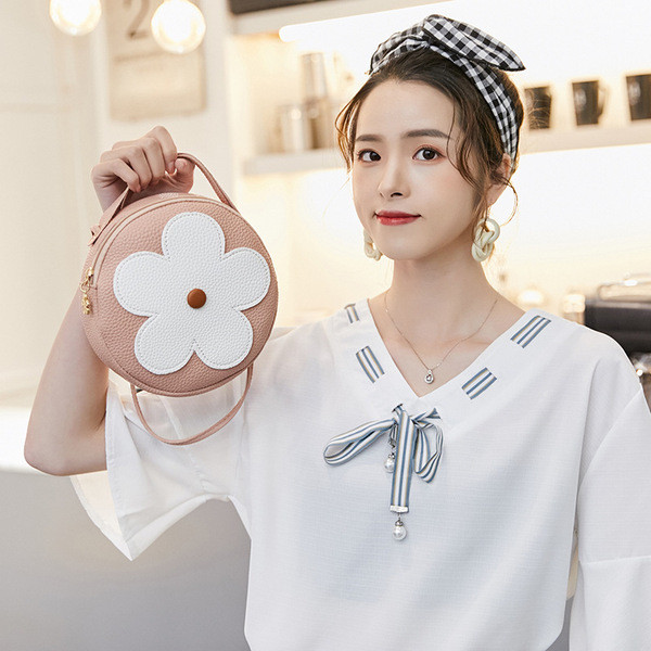 Geanta de dama moderna in forma rotunda