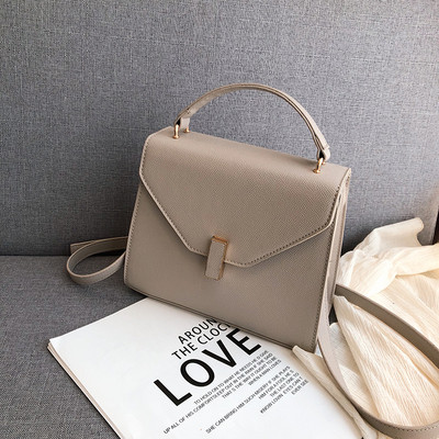 Geanta de dama eleganta cu inchidere metalica in mai multe culori