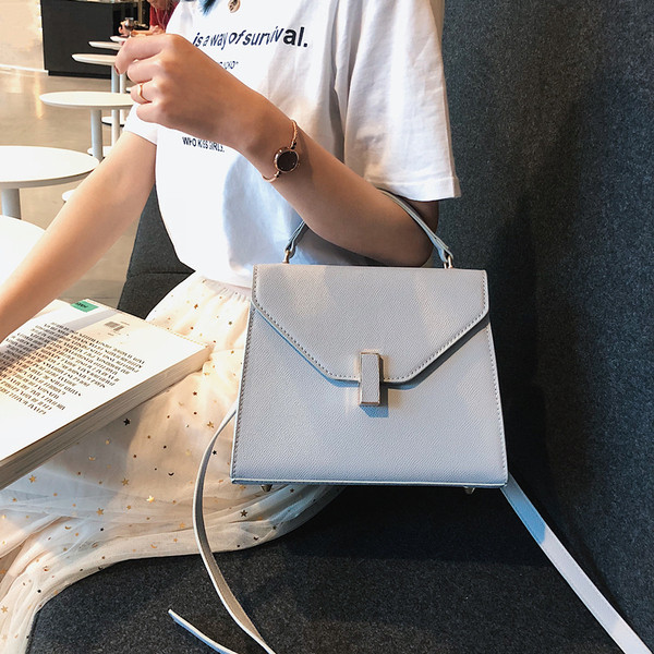 Geanta de dama eleganta cu inchidere metalica in mai multe culori