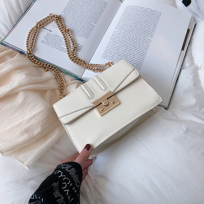 Geantă de damă elegantă din piele ecologică cu lanț metalic