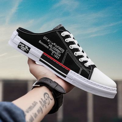 Casual ανδρικά παπούτσια σε άσπρο και μαύρο χρώμα με επίπεδη σόλα