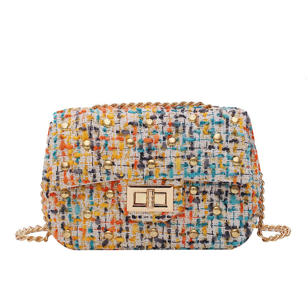 Geanta de dama eleganta cu model colorat si inchidere metalica
