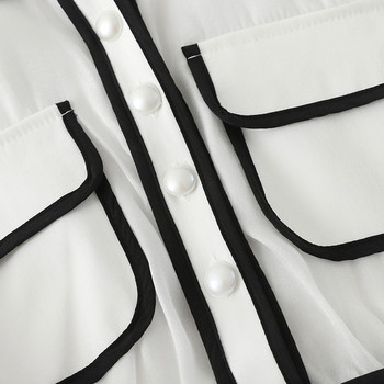 Stílusos női ruha gallérral és rövid ujjú fekete-fehér színben