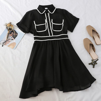 Stílusos női ruha gallérral és rövid ujjú fekete-fehér színben