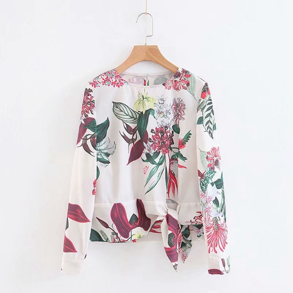 Bluză de damă elegantă cu mâneci lungi și legături în talie