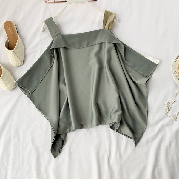 Női modern blúz pántokkal több színben