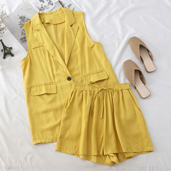 Set elegant pentru femei, care include o vestă și pantaloni scurți în mai multe culori