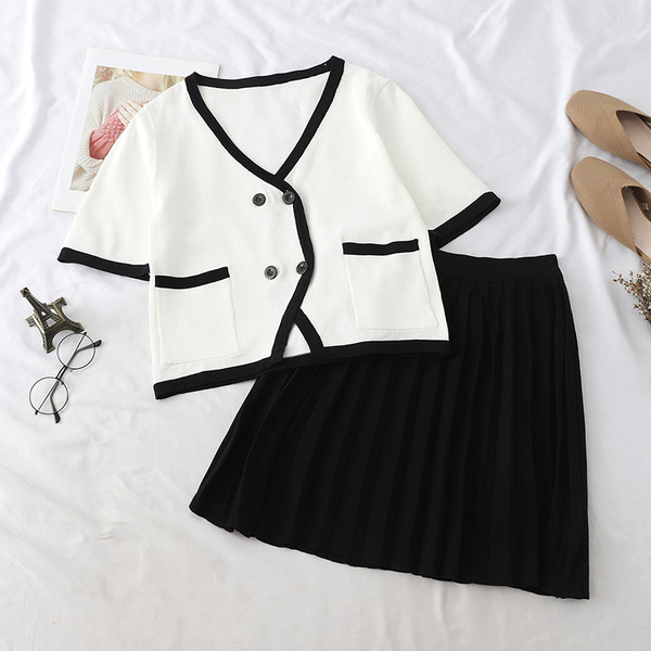 Set elegant pentru femei, care include cămașă și fustă alb-negru