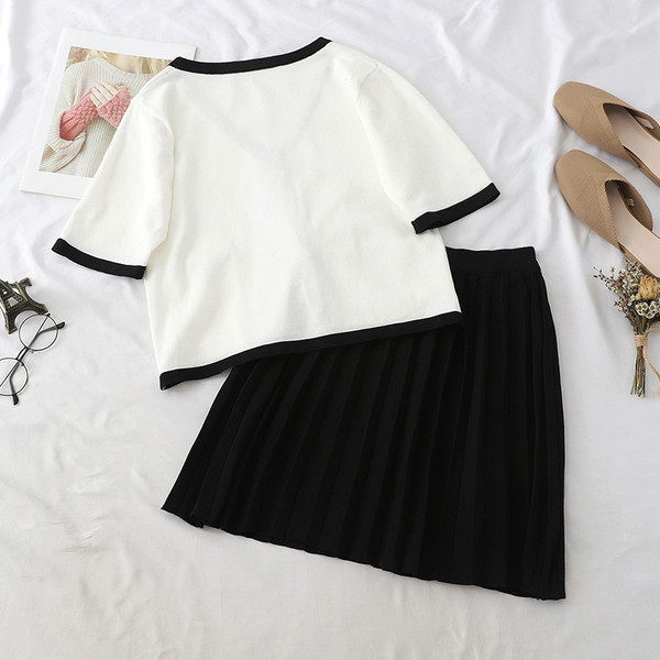 Set elegant pentru femei, care include cămașă și fustă alb-negru