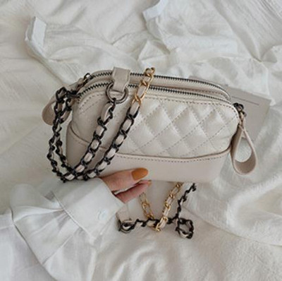 Eko bőrből készült alkalmi női táska két színben, cipzárral