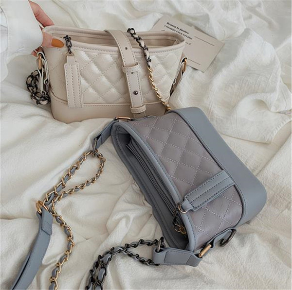 Eko bőrből készült alkalmi női táska két színben, cipzárral