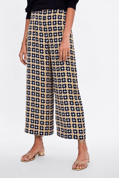 Pantaloni largi de dama cu lungimea de 9/10 cu model cu model