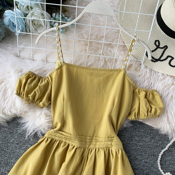 Модерна дамска рокля разкроен модел с елемент-перли в три цвята