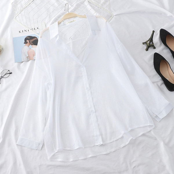 Cămașă elegantă de damă, model larg, cu mâneci lungi, în negru, alb și verde