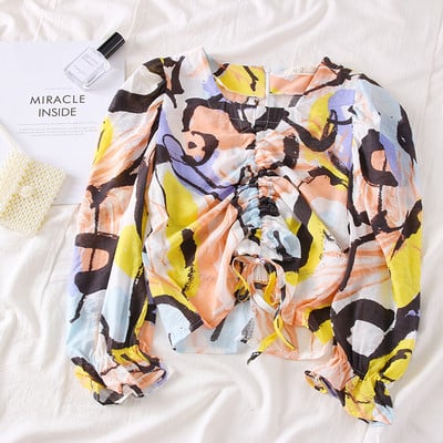 Bluză de damă colorată cu decolteu în V și șireturi în două culori