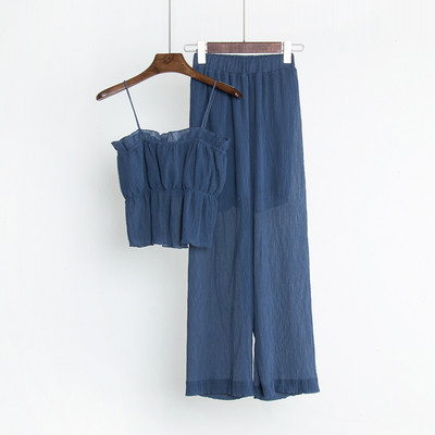 Set modern pentru femei care include un maiou cu bretele subțiri și pantaloni largi în mai multe culori