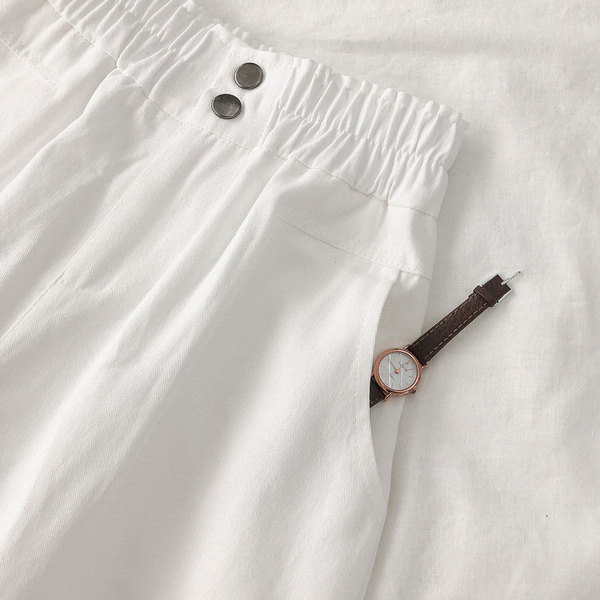 Pantaloni casual de dama cu talie inalta si buzunar in alb si negru