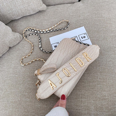 Női kis táska hosszú füllel több színben