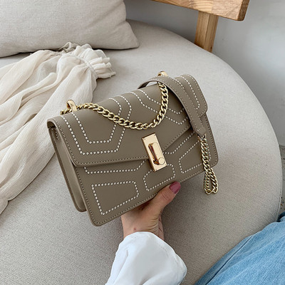 Geanta de dama eleganta cu inchidere metalica in mai multe culori