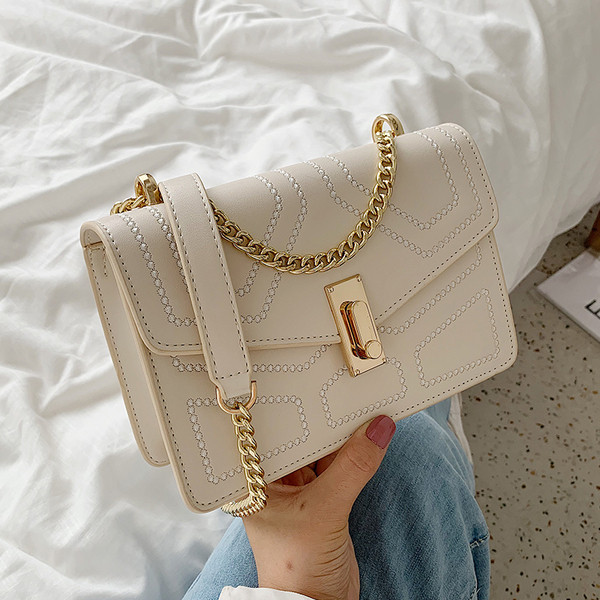 Geanta de dama eleganta cu inchidere metalica in mai multe culori