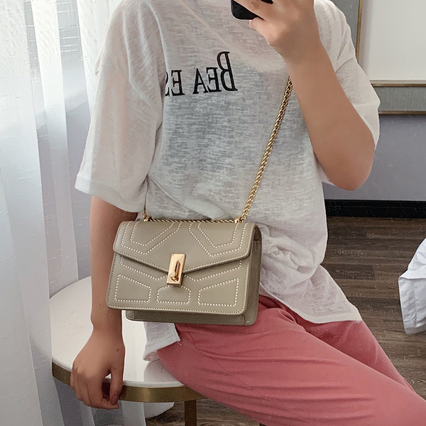 Geanta de dama eleganta cu inchidere metalica in mai multe culori