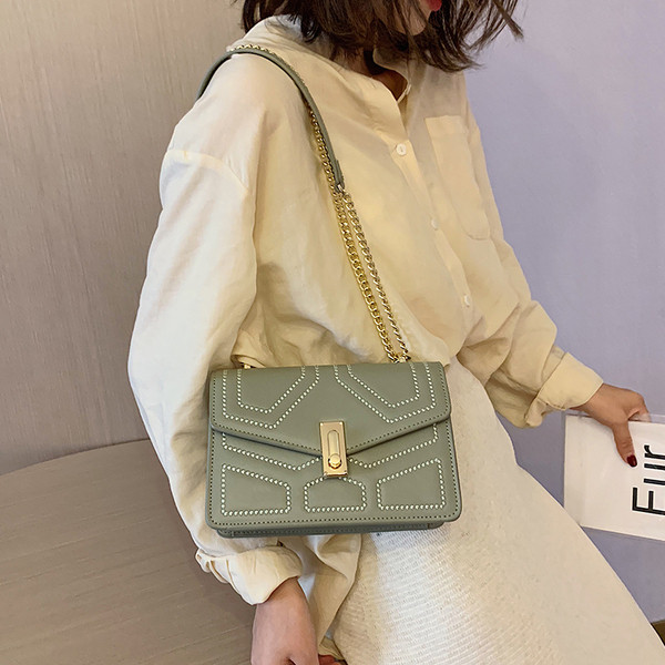 Geanta de dama eleganta cu inchidere metalica in mai multe culori