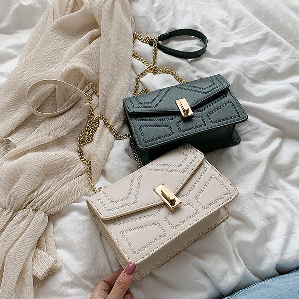 Geanta de dama eleganta cu inchidere metalica in mai multe culori