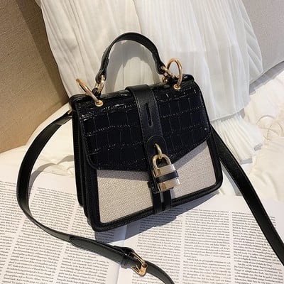 Geanta de dama moderna cu inchidere metalica in doua culori