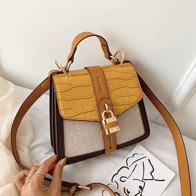 Geanta de dama moderna cu inchidere metalica in doua culori