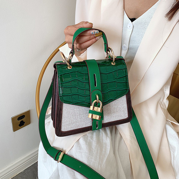 Geanta de dama moderna cu inchidere metalica in doua culori