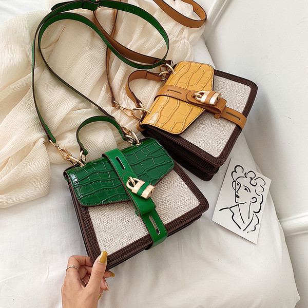 Geanta de dama moderna cu inchidere metalica in doua culori