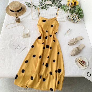 Дамска рокля на точки в жълт цвят и тънки презрамки