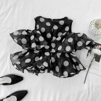 Bluză de damă cu buline cu fermoar în alb și negru