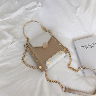 Geanta de dama cu manere metalice in patru culori