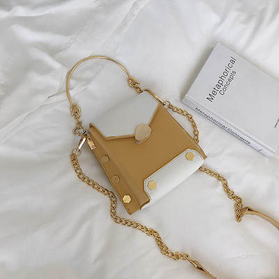 Geanta de dama cu manere metalice in patru culori