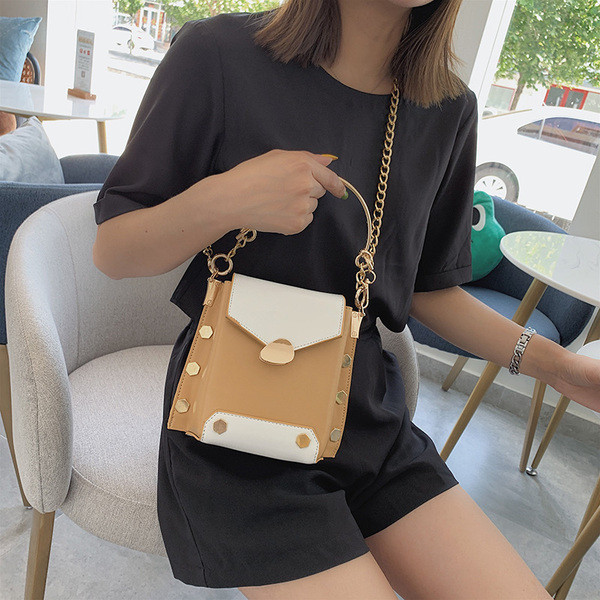 Geanta de dama cu manere metalice in patru culori