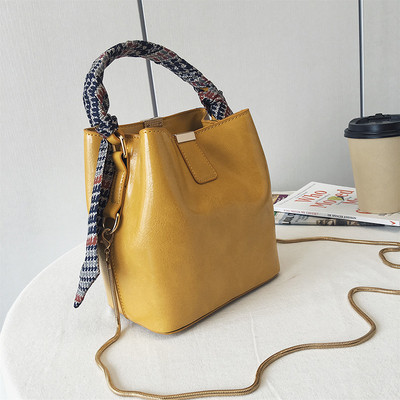 Geanta de dama din piele ecologica cu maner metalic lung