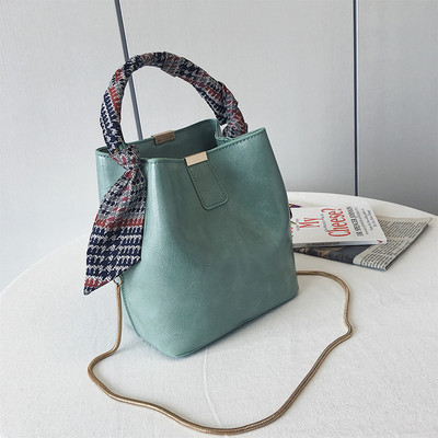 Geanta de dama din piele ecologica cu maner metalic lung