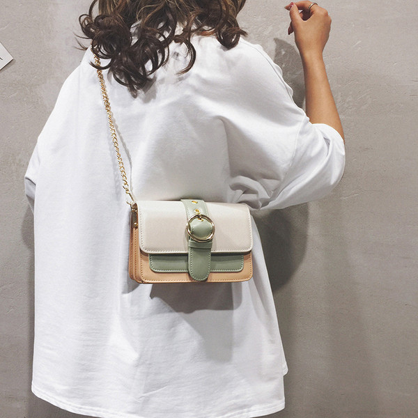 Geanta de dama moderna cu catarama in trei culori